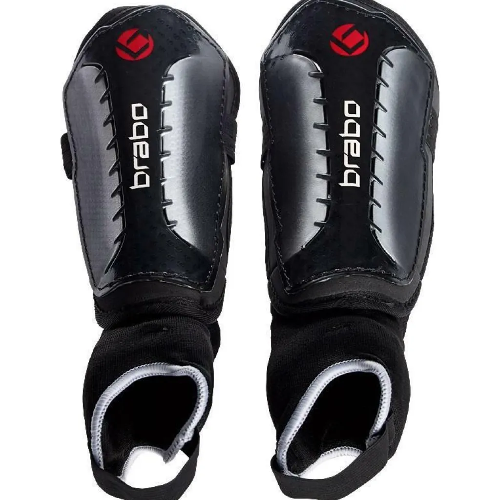 Brabo F4 Metallic scheenbeschermers junior zwart< Hockey Bescherming