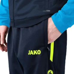 JAKO Allround Polyester trainingsbroek marine fluogeel< Voetbalkleding